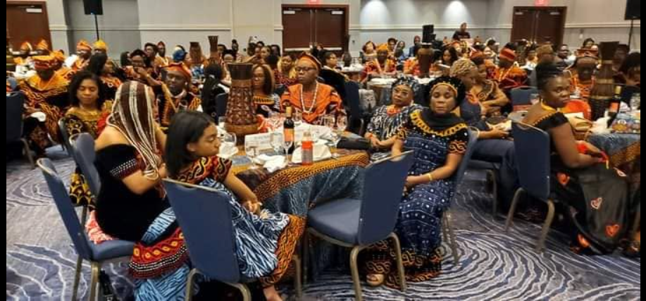 BCA-USA members wearing beadwork and embroidered caps at a cultural gathering