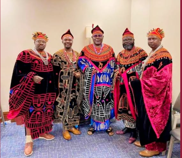 Five men wearing traditional Toghu regalia