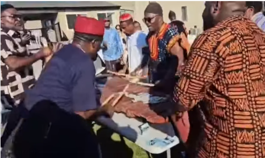 Bali Nyonga musicians playing a traditional wooden xylophone and drum