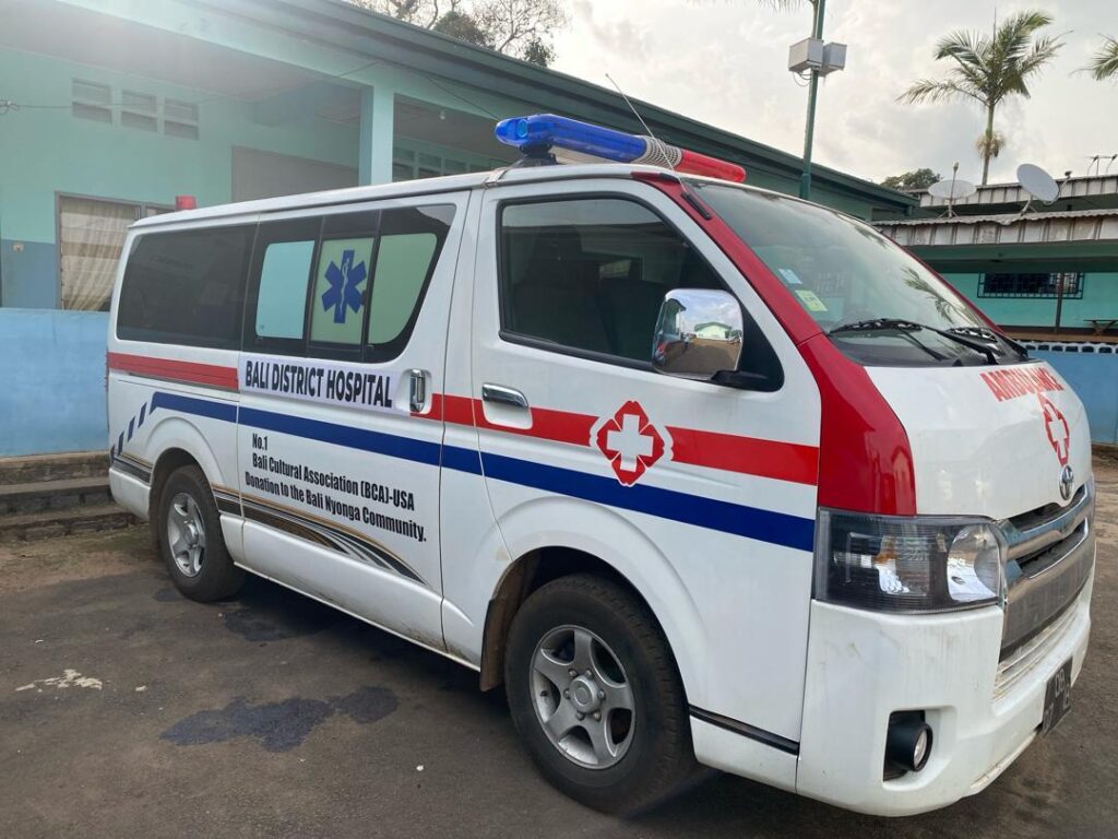 White ambulance lettered for Bali District Hospital and as a BCA-USA donation